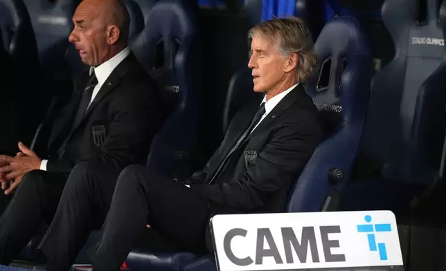 Italy head coach Roberto Mancini sits on the bench during the Nations League soccer match between Italy and Belgium in Rome, Friday, Sept. 25, 2026. (AP Photo/Andrew Medichini)