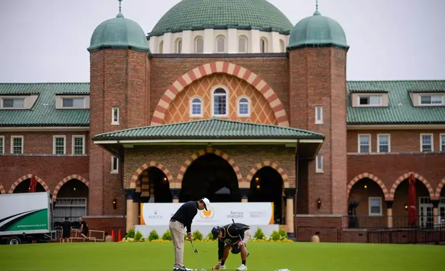 International teams' Hideki Matsuyama, of Japan, practices prior to the start of the Presidents Cup golf tournament against the USA team at Medinah Country Club, Monday, Sept. 21, 2026, in Medinah, Ill. (AP Photo/Matt Slocum)