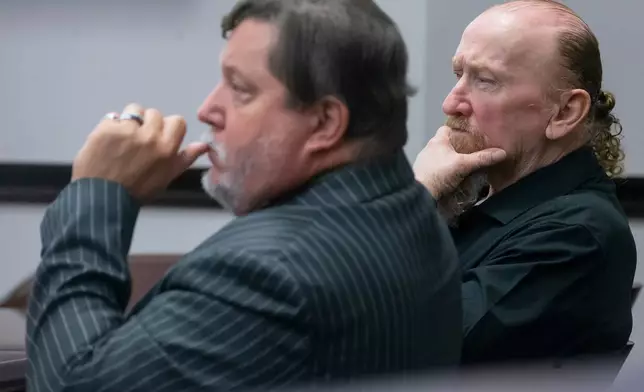 Defendant James Dolphs Elmore Jr., right, sits with his attorney, William Agnew, while listening to witness testimony during his trial in Galveston, Texas, Tuesday, Sept. 1, 2026. (Stuart Villanueva/The Galveston County Daily News via AP, Pool)