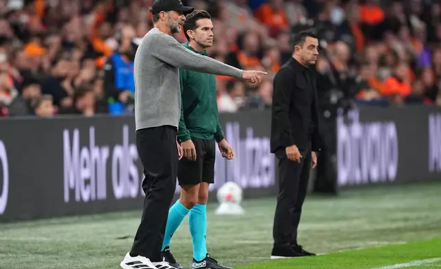 Germany's coach Jurgen Klopp talks to match official during the UEFA Nations League soccer match between the Netherlands and Germany in Amsterdam, Netherlands, Thursday, Sept. 24, 2026. (AP Photo/Martin Meissner)