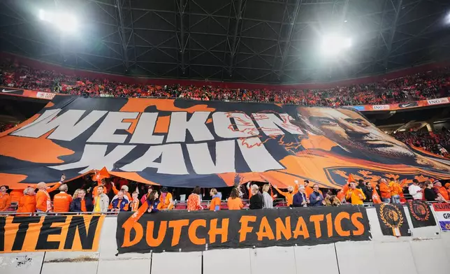 Dutch fans hols a banner welcoming Netherlands coach Xavi Hernandez during the UEFA Nations League soccer match between the Netherlands and Germany in Amsterdam, Netherlands, Thursday, Sept. 24, 2026. (AP Photo/Martin Meissner)