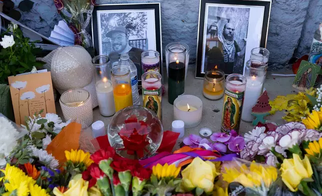 A growing memorial sits outside the Venture-N Bar in Tucson, Ariz., Tuesday, Sept. 1, 2026, for Vincent Siquieros and Cameron Capara, pictured, who were fatally shot in the parking lot of the gay bar shortly after midnight Monday. (AP Photo/Rebecca Noble)