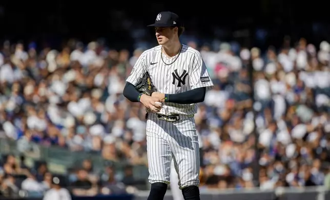 New York Yankees Cam Schlittler prepares to throw during the fourth inning of a baseball game against the New York Mets, Sunday, Sept. 13, 2026, in New York. (AP Photo/Angelina Katsanis)