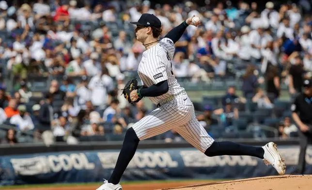 New York Yankees Cam Schlittler throws during the first inning of a baseball game against the New York Mets, Sunday, Sept. 13, 2026, in New York. (AP Photo/Angelina Katsanis)