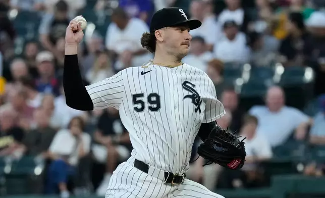 Chicago White Sox starting pitcher Sean Burke throws against the Pittsburgh Pirates during the first inning of a baseball game in Chicago, Tuesday, Sept. 8, 2026. (AP Photo/Nam Y. Huh)