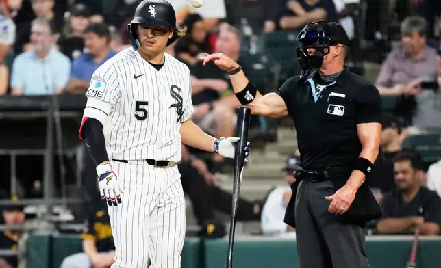 Chicago White Sox's Munetaka Murakami, of Japan, walks to the dugout after being called out on strikes during the first inning of a baseball game against the Pittsburgh Pirates in Chicago, Tuesday, Sept. 8, 2026. (AP Photo/Nam Y. Huh)