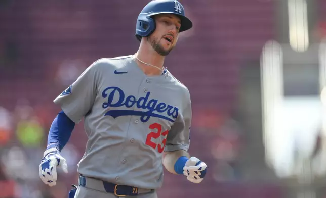 Los Angeles Dodgers' Kyle Tucker rounds the bases after a two-run home run during the first inning of a baseball game against the Cincinnati Reds, Thursday, Sept. 17, 2026 in Cincinnati. (AP Photo/Tanner Pearson)