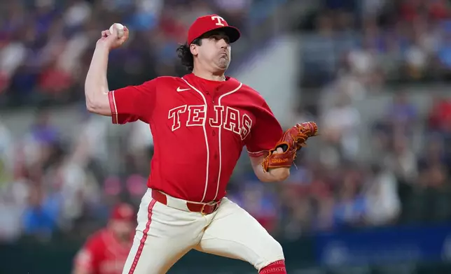 Texas Rangers starting pitcher Cal Quantrill throws to the Toronto Blue Jays during the first inning of a baseball game Saturday, Sept. 19, 2026, in Arlington, Texas. (AP Photo/Julio Cortez)