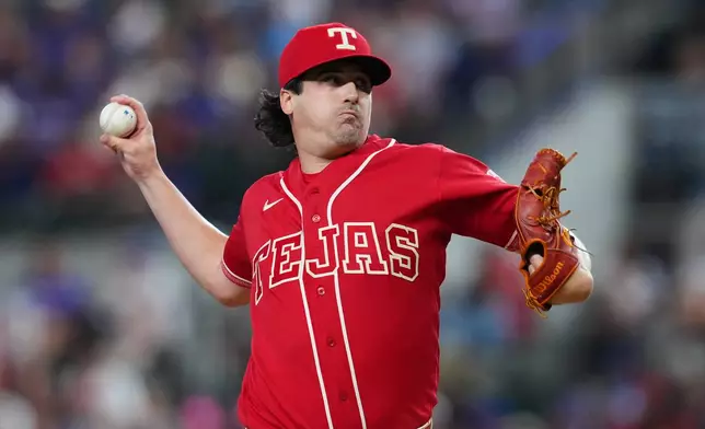 Texas Rangers starting pitcher Cal Quantrill throws to the Toronto Blue Jays during the first inning of a baseball game Saturday, Sept. 19, 2026, in Arlington, Texas. (AP Photo/Julio Cortez)