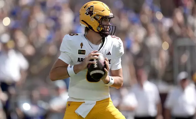 Arizona State quarterback Cutter Boley (8) looks to pass downfield against Texas A&M during the first quarter of an NCAA college football game Saturday, Sept. 12, 2026, in College Station, Texas. (AP Photo/Sam Craft)