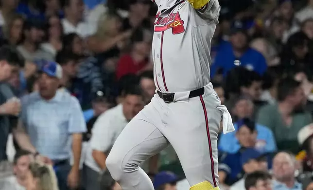 Atlanta Braves' Ronald Acuña Jr. celebrates as he round the bases after hitting a two-run home run during the sixth inning of a baseball game against the Chicago Cubs in Chicago, Tuesday, Sept. 15, 2026. (AP Photo/Nam Y. Huh)
