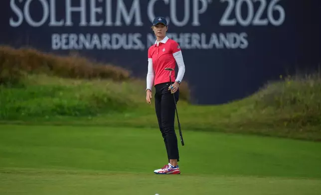 Nelly Korda of the United States misses a putt on the 15th green during the final day of the Solheim Cup in Den Bosch, Netherlands, Sunday, Sept. 13, 2026. (AP Photo/Alastair Grant)
