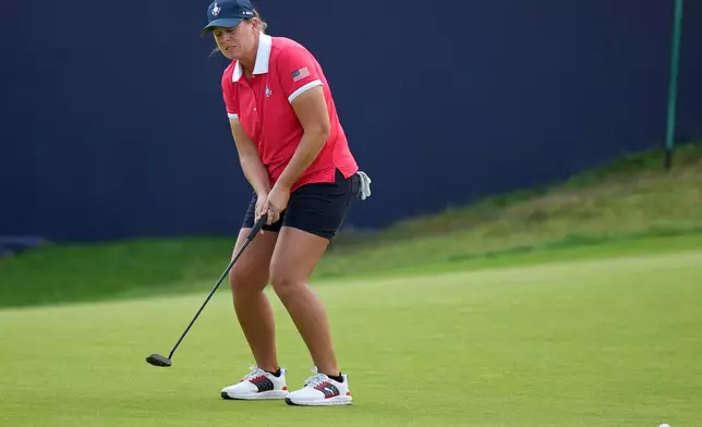 Lauren Coughlin of the United States reacts as she misses a putt on the 15th green during the final day of the Solheim Cup in Den Bosch, Netherlands, Sunday, Sept. 13, 2026. (AP Photo/Alastair Grant)
