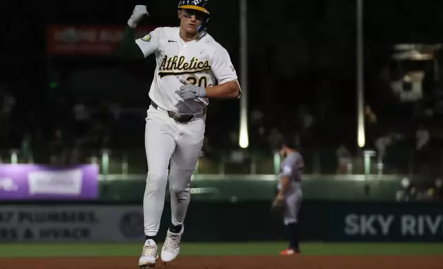 Athletics' Zack Gelof jogs around the bases after hitting a solo home run during the third inning of a baseball game against the Houston Astros Thursday, Sept. 24, 2026, in West Sacramento, Calif. (AP Photo/Scott Marshall)