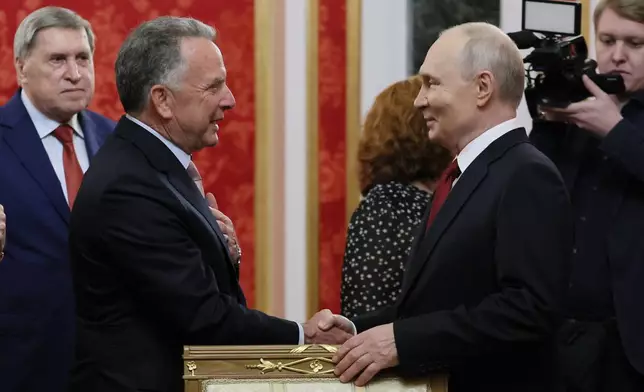 President Vladimir Putin, right, greets U.S. President Donald Trump's envoy Steve Witkoff, prior to talks at the Senate Palace of the Kremlin in Moscow, on Saturday, Sept. 5, 2026. (Mikhail Metzel/Sputnik/Kremlin Pool Photo via AP)