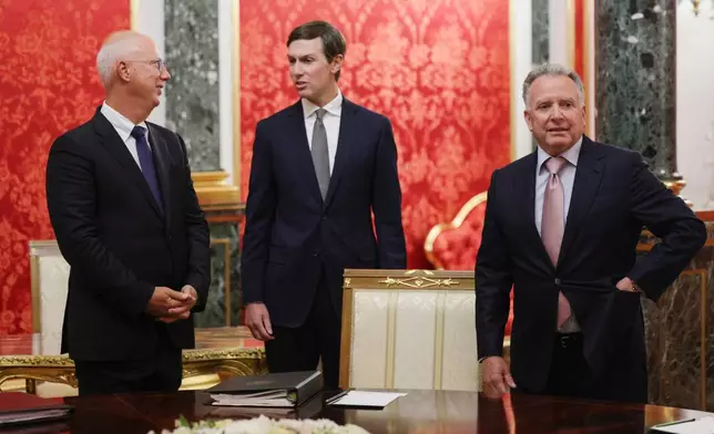 U.S. President Donald Trump's envoys Steve Witkoff, right, Jared Kushner, center, and Presidential Envoy Kirill Dmitriev stand prior to talks at the Senate Palace of the Kremlin in Moscow, on Saturday, Sept. 5, 2026. (Gavriil Grigorov/Sputnik/Kremlin Pool Photo via AP)