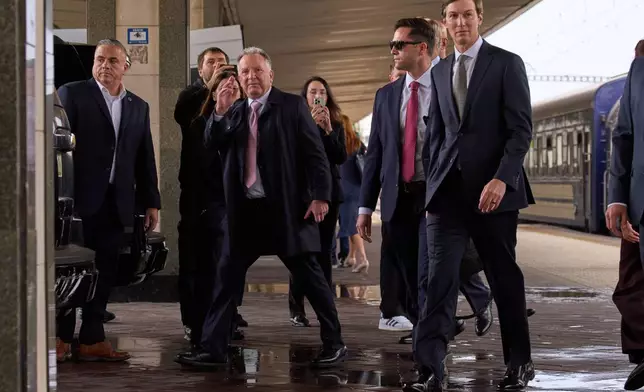 U.S. President Donald Trump's envoys Steve Witkoff, center, and Jared Kushner, right, arrive in Kyiv, Ukraine, Sunday, Sept. 6, 2026. (AP Photo/Francisco Seco)