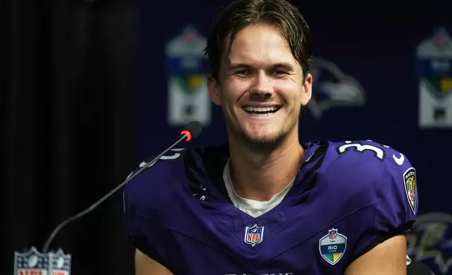 Baltimore Ravens place kicker Tyler Loop speaks during a press conference after an NFL football game against the Dallas Cowboys in Rio de Janeiro, Sunday, Sept. 27, 2026. (AP Photo/Andre Penner)