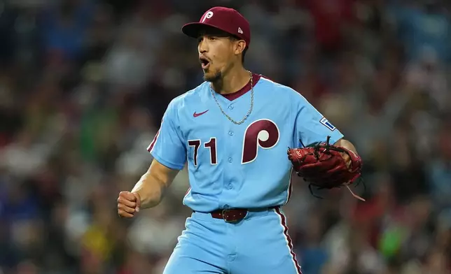 Philadelphia Phillies pitcher Alex McFarlane reacts during the seventh inning of a baseball game against the Milwaukee Brewers, Thursday, Sept. 24, 2026, in Philadelphia. (AP Photo/Matt Rourke)