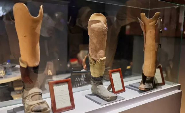 Prosthetic limbs found at Syria's prisons are displayed at "When the Walls Speak," an exhibit at the Damascus International Fair featuring items from prisons during the rule of former President Bashar Assad, in Damascus, Syria, Monday, Aug. 31, 2026. (AP Photo/Ghaith Alsayed)