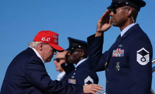 President Donald Trump boards Air Force One at Morristown Airport, Monday, Sept. 7, 2026, in Morristown, N.J. (AP Photo/Julia Demaree Nikhinson)