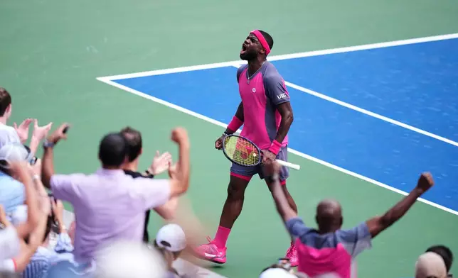 Frances Tiafoe, of the United States, reacts during a match against Daniil Medvedev, of Russia, during the fourth round of the U.S. Open tennis championships, Sunday, Sept. 6, 2026, in New York. (AP Photo/Frank Franklin II)