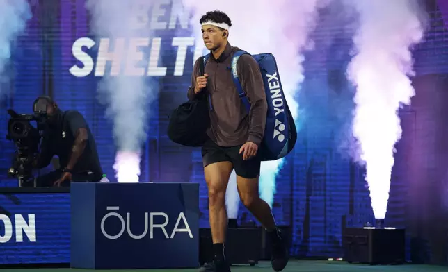 Ben Shelton, of the United States, arrives for a match against Stefanos Tsitsipas, of Greece, during the fourth round of the U.S. Open tennis championships, Sunday, Sept. 6, 2026, in New York. (AP Photo/Adam Hunger)