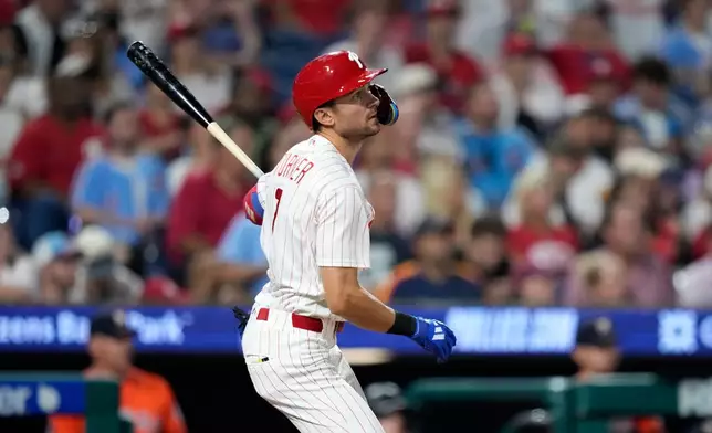Philadelphia Phillies' Trea Turner watches after hitting a home run against Houston Astros pitcher Hunter Brown during the fifth inning of a baseball game Wednesday, Sept. 9, 2026, in Philadelphia. (AP Photo/Matt Slocum)
