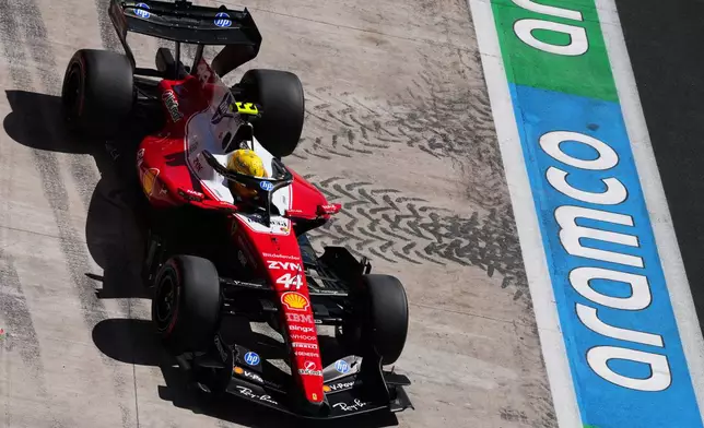 Ferrari driver Lewis Hamilton of Britain steers his car during the third free practice ahead of the Spanish Formula One Grand Prix in Madrid, Saturday, Sept. 12, 2026. (AP Photo/Manu Fernandez)