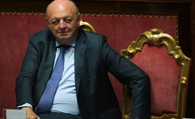 Italian Minister of Environment and Energy Security Gilberto Pichetto Fratin attends a debate prior to a vote to give the final approval to legislation paving the way for the eventual return of nuclear energy to Italy, in Rome, Wednesday, Sept. 23, 2026. (AP Photo/Andrew Medichini)
