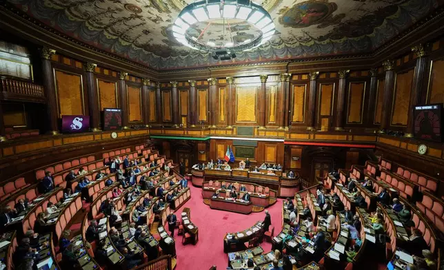 Senators vote for the final approval to legislation paving the way for the eventual return of nuclear energy to Italy, in Rome, Wednesday, Sept. 23, 2026. (AP Photo/Andrew Medichini)