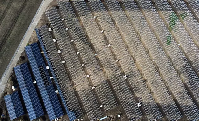 FILE - A new solar farm is being built near Quedlinburg, Germany, May 26, 2025. (AP Photo/Matthias Schrader, File)