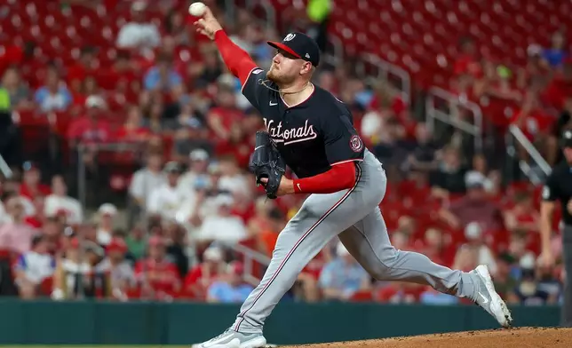 Washington Nationals starting pitcher Cade Cavalli throws during the first inning of a baseball game against the St. Louis Cardinals, Friday, Sept. 18, 2026, in St. Louis. (AP Photo/Scott Kane)