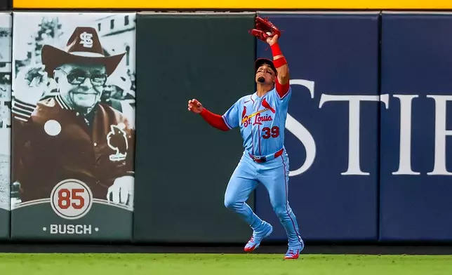 St. Louis Cardinals' Bryan Torres catches a sacrifice fly hit by Washington Nationals' Daylen Lile during the fourth inning of a baseball game Friday, Sept. 18, 2026, in St. Louis. (AP Photo/Scott Kane)