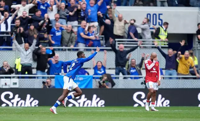 Everton's Ainsley Maitland-Niles celebrates scoring their side's second goal of the game during the English Premier League soccer match between Everton and Manchester United in Liverpool, England, Sunday, Sept. 6, 2026. (Peter Byrne/PA via AP)