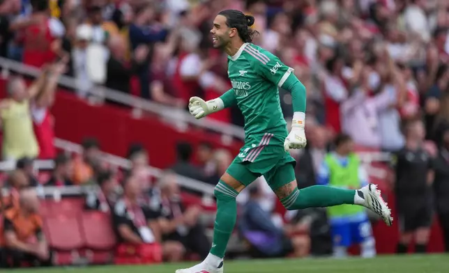 Arsenal's goalkeeper David Raya reacts during the English Premier League soccer match between Arsenal and Chelsea in London, Sunday, Sept. 6, 2026. (AP Photo/Dave Shopland)