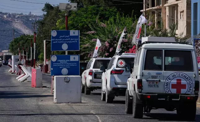 A Red Cross convoy passes a Lebanese checkpoint near the border with Israel in the southern village of Mansouri, Lebanon, Friday, Sept. 4, 2026. (AP Photo/Mohammed Zaatari) CORRECTION: A Red Cross convoy, instead of U.N. peacekeeper convoy