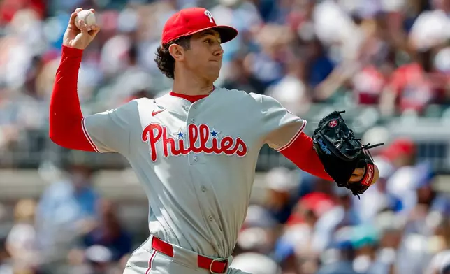Philadelphia Phillies pitcher Andrew Painter delivers to an Atlanta Braves batter during the first inning of a baseball game, Sunday, Sept. 13, 2026, in Atlanta. (AP Photo/Erik S. Lesser)