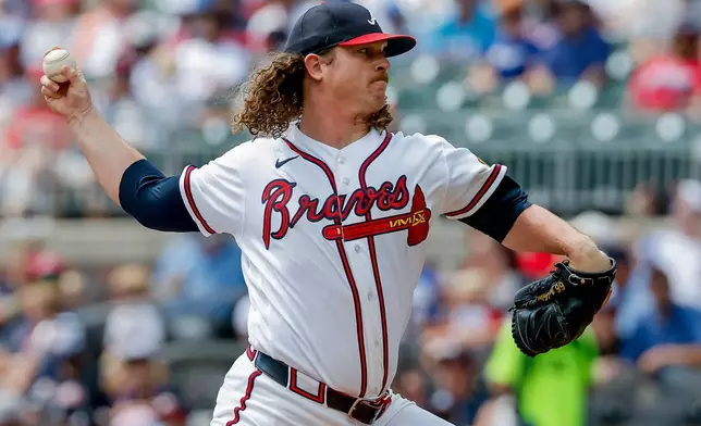 Atlanta Braves pitcher Grant Holmes delivers to a Philadelphia Phillies batter during the first inning of a baseball game, Sunday, Sept. 13, 2026, in Atlanta. (AP Photo/Erik S. Lesser)