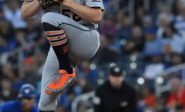 Detroit Tigers starting pitcher Troy Melton throws to a Toronto Blue Jays batter during the first inning of a baseball game in Toronto, Monday, Sept. 14, 2026. (Jon Blacker/The Canadian Press via AP)
