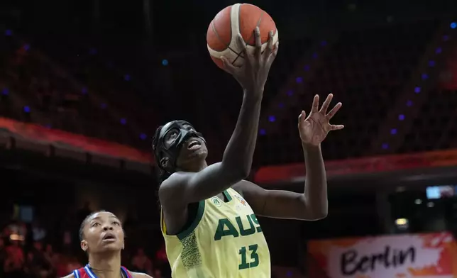 Australia's Ezi Magbegor lays up during the Women's Basketball World Cup match between Australia and Puerto Rico in Berlin, Friday, Sept. 4, 2026. (AP Photo/Ebrahim Noroozi)