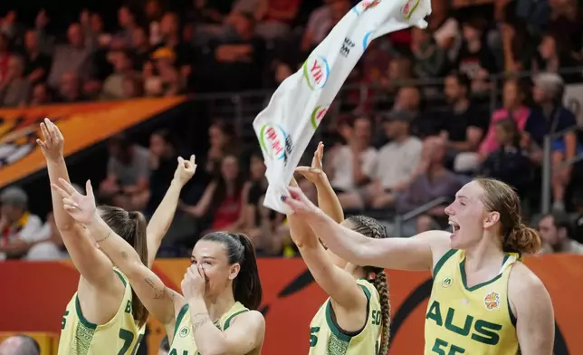 Australian players react during the Women's Basketball World Cup match between Australia and Puerto Rico in Berlin, Friday, Sept. 4, 2026. (AP Photo/Ebrahim Noroozi)
