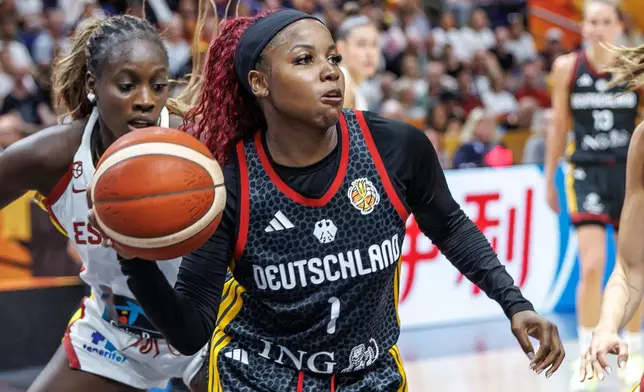 Germany's Alexis Peterson in action during a Women's World Cup basketball game between Germany and Spain, in Berlin, Friday, Sept. 4, 2026. (Andreas Gora/dpa via AP)