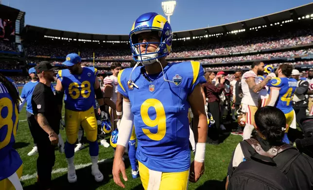 Los Angeles Rams quarterback Matthew Stafford (9) leaves the field after a loss to the San Francisco 49ers in an NFL football game in Melbourne, Australia, Friday, Sept. 11, 2026. (AP Photo/Doug Benc)