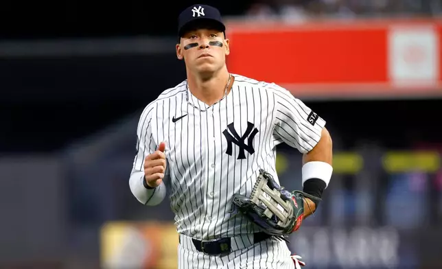 New York Yankees' Aaron Judge walks to the dugout during the first inning of a baseball game against the Colorado Rockies, Tuesday, Sept. 8, 2026, in New York. (AP Photo/Noah K. Murray)
