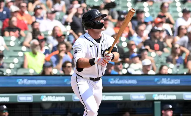 Detroit Tigers' Kevin McGonigle watches after hitting a triple during the second inning of a baseball game against the Colorado Rockies, Sunday, Sept. 13, 2026, in Detroit. (AP Photo/Jose Juarez)