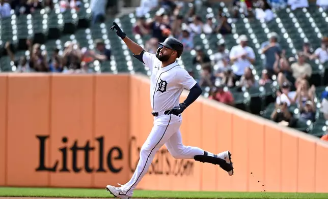 Detroit Tigers' Riley Greene reacts after hitting a two-run home run during the first inning of a baseball game against the Colorado Rockies, Sunday, Sept. 13, 2026, in Detroit. (AP Photo/Jose Juarez)