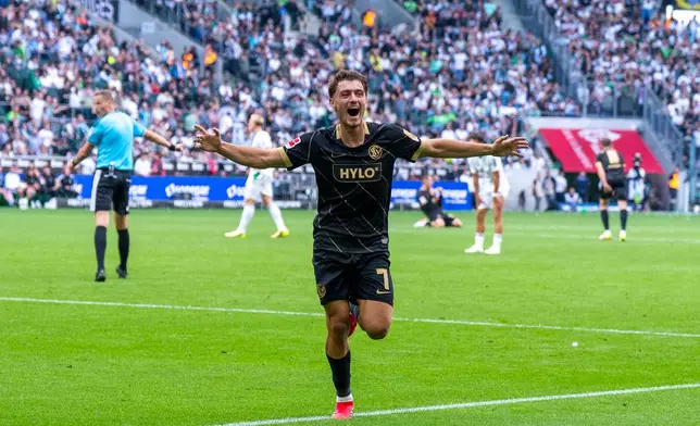 Elversberg's Maurice Krattenmacher celebrates scoring during the Bundesliga soccer match between Borussia Mönchengladbach and SV Elversberg in Mönchengladbach, Germany, Saturday Sept. 5, 2026. (David Inderlied/dpa via AP)