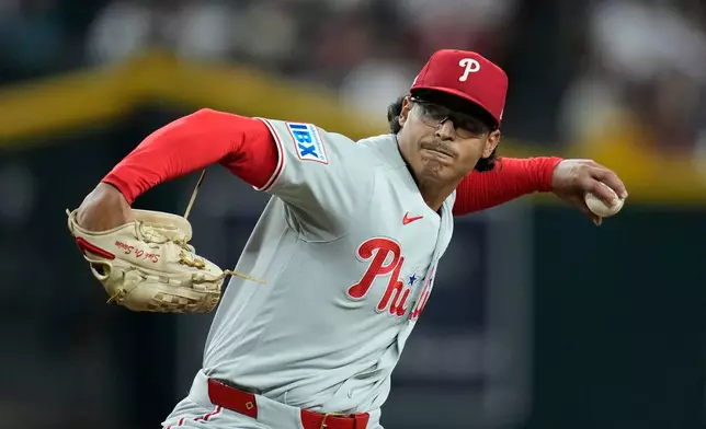 Philadelphia Phillies starting pitcher Jesús Luzardo throws against the Arizona Diamondbacks during the first inning of a baseball game, Tuesday, Sept. 1, 2026, in Phoenix. (AP Photo/Ross D. Franklin)