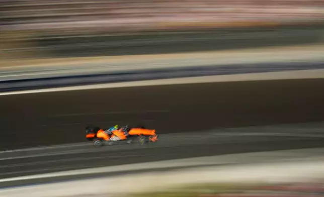 McLaren driver Lando Norris of Britain steers his car during the qualifying session ahead of the Spanish Formula One Grand Prix in Madrid, Saturday, Sept. 12, 2026. (AP Photo/Manu Fernandez)